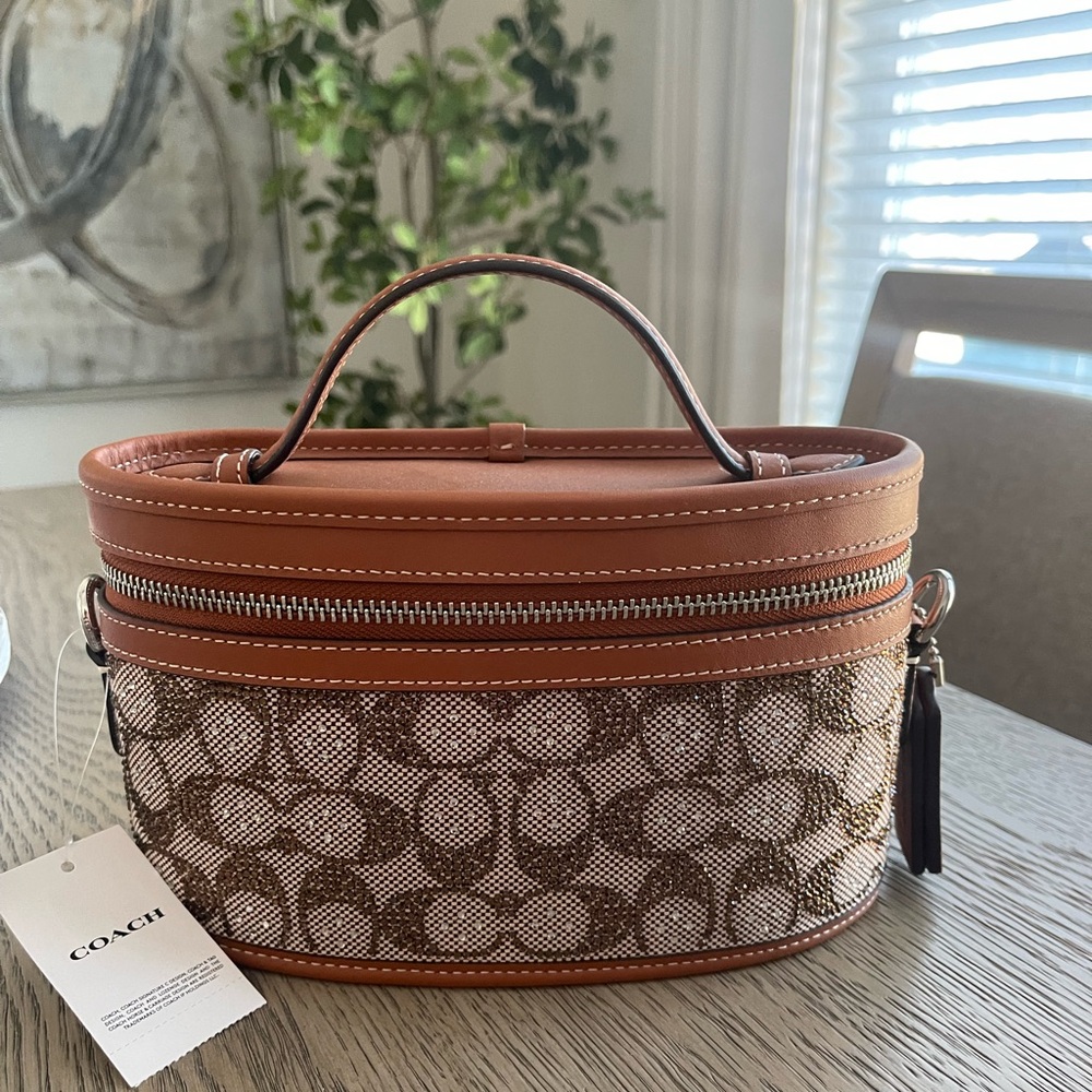SOLD…..Coach Signature Crystal Trail bag